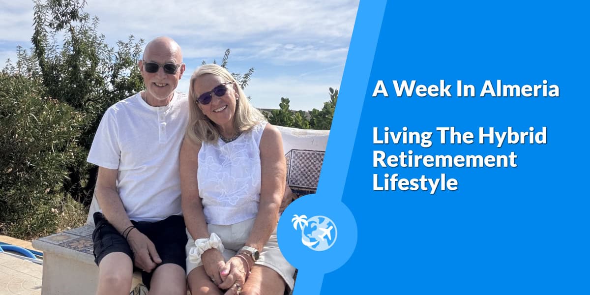 Chris And Susan Beesley on a seat with beautiful mountain views in the background